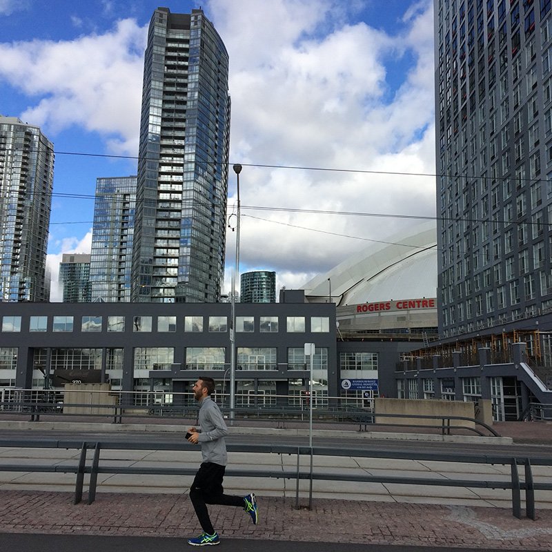 Man running in downtown Toronto